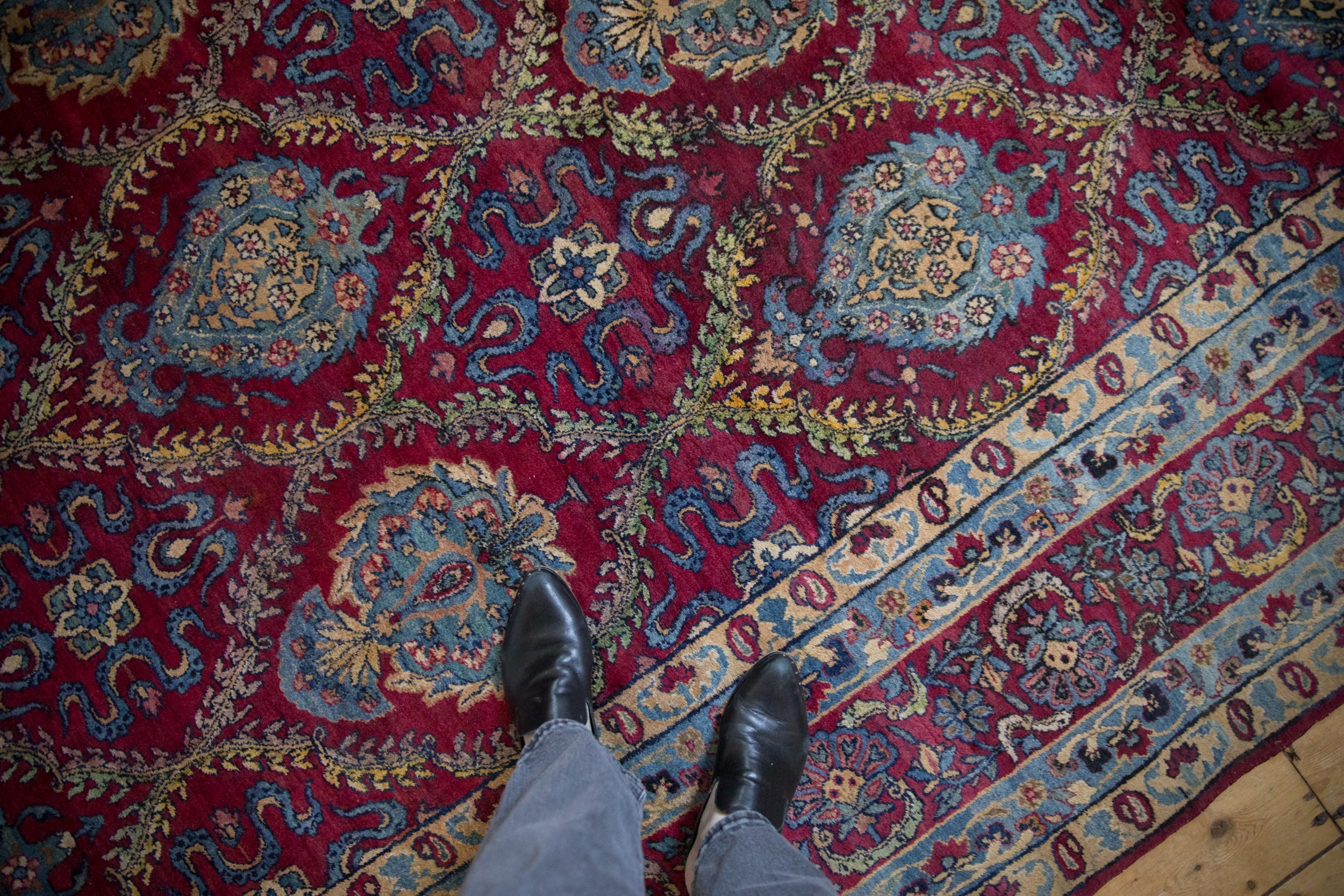 Antique Yezd carpet with allover floral vine trellis and cloudband border, burgundy, blue, saffron.