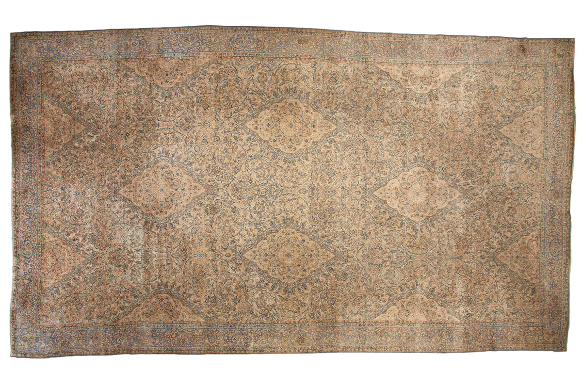 Vintage Tea Washed Kerman carpet, allover scalloped medallions and arabesque border in soft ivory and blue.
