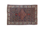 Antique Bijar rug, deep cobalt Herati field, ruby medallion, stylized floral ivory border. 4'7" x 6'9".