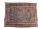 Early 20th century hand woven Soumac carpet, tribal geometric medallions, madder red field, 5'9" x 8'.
