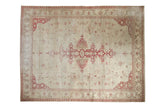 Distressed vintage Amritsar carpet with a raspberry red medallion on a worn ivory field, size 9' x 11'9