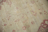 Distressed texture of a vintage Amritsar carpet showing mostly even wear to the knot heads.