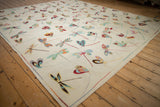Plain woven Kilim rug close-up featuring multi-colored dragonfly pictorial motifs.