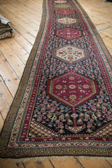 Plum hexagonal medallion and navy field with henna plant boteh motif, antique Karabagh.