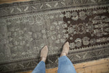 Distressed vintage Malayer runner, showing abrash from oxidized silver to chocolate brown.