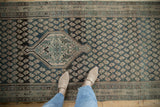 Distressed Persian Malayer runner, hexagonal medallion, allover botehs, and vivid teal abrashes.