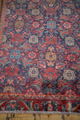 Vintage Tabriz runner's Herati design, lower border in deep blue, red, with fringe.