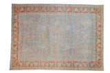 Vintage distressed Mahal carpet with allover floral blossoms in terracotta and cream on a powder blue field.