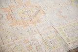 Distressed Oushak design carpet pile texture, showing foundation, faded platinum, ivory, saffron.