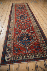 Long perspective view of the vintage Serab runner highlighting its interconnected hexagonal medallions.