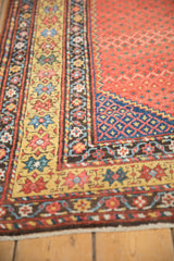 Antique Northwest Persian runner corner, saffron yellow starburst, sapphire blue geometry.