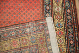 Detail of the antique Northwest Persian rug's hand-knotted foundation and preserved side selvage.