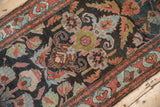 Distressed Mehreban runner's worn field, serrated leaves, tendrils, dusty blue, and wine red.