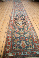 Distressed Mehreban runner section featuring palmettes, tendrils, blue, red, green.