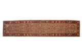 Antique Karabagh rug runner with an allover Herati design on a camel field and a rich red floral border.