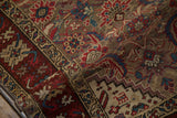 Detailed texture of a folded antique Karabagh runner with Herati and crab style floral motifs.