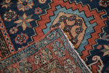 Vintage Karaja runner: hand-knotted geometric pile and woven foundation with fringe.