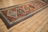 Serab runner corner with blue diamond medallion, madder red field, and distinct pawn motif border.