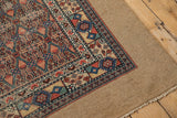 Original wide, plain-woven camel band framing the geometric border of an antique Persian Serab rug.