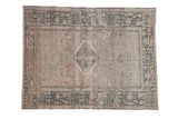 Vintage distressed Karaja rug with a geometric diamond medallion in beige, sand, and dusty teal.