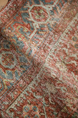 Softly folded vintage Karaja rug showing its character-rich, distressed pile.