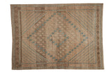 Distressed vintage Afshar rug with faded ivory lattice design and dusty blue serrated leaf border.