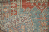 Hand-knotted foundation and secured selvage on a folded corner of a vintage Oushak rug.