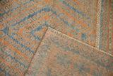 Belouch rug hand-knotted back and distressed pile, blue terracotta geometric pattern.