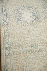 Decorative distressed texture and Herati pattern on this vintage Sparta rug.