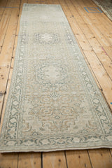 Distressed vintage Sparta runner detail, showing Herati pattern, soft pile, and ecru, teal, silver tones.