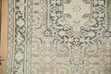 Distressed Sparta runner's side selvage, dusty ecru, pale coffee brown, and teal Herati pattern.
