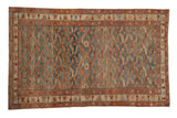 Vintage distressed Persian Malayer rug with an allover fish design in dusty blue and ruby red.