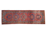 Antique Heriz runner, brick red field, triple indigo and teal geometric medallions, 3'4