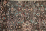 Vintage Hamadan runner's Herati motif detail: oxidized silver, dusty blush, mint green colors, even pile wear.