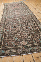 Worn geometric Herati pattern and serrated leaf border on vintage Hamadan runner.