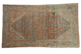 Antique distressed Serbend rug, featuring teal and terracotta floral field with notable abrashes.