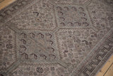 Aged texture of vintage Qashqai runner with pinwheel motifs in faded fascia and slate blue.