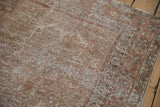 Distressed pile of the Mahal rug, showing faded tree-of-life motifs and palmette border.
