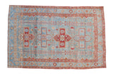 Distressed vintage Malayer rug, powder blue field, geometric medallions, raspberry red motifs, subtle abrashes. 4'9