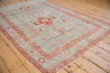 Distressed Malayer rug with Ahar geometric medallion, germinating vines in powder blue, raspberry.