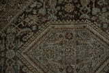 Distressed Northwest Persian rug, dusty blue Herati motif, and serrated corner spandrel.