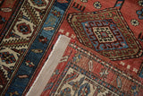 Restored side cord and handwoven foundation on a corner of an antique Persian runner.