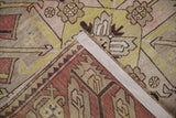 View of the hand-knotted foundation and restored edge of an antique Kazak rug runner.