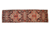 Antique Karabagh runner: navy, ivory, and red double medallions, Rococo blossoms, 3'7