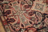 Antique Karabagh rug with rococo style leaves in navy, ivory, and brick red.