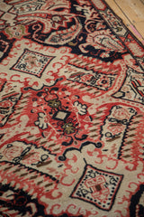 Antique Armenian Karabagh runner's hand-knotted pile shows rococo leaves in navy, red, ivory.