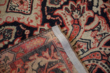 Antique Karabagh rug's hand knotted construction, showing front pile and tight reverse weave.