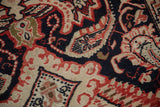 Rococo style leaves and paisley botehs in navy, ivory, red on hand-knotted pile.
