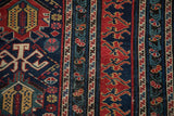 Close view of the Shirvan runner's unique reciprocating dragon motifs within the multi-tiered borders.