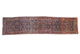 Vintage Bijar rug runner with a navy blue Herati field and dusty blush floral border.